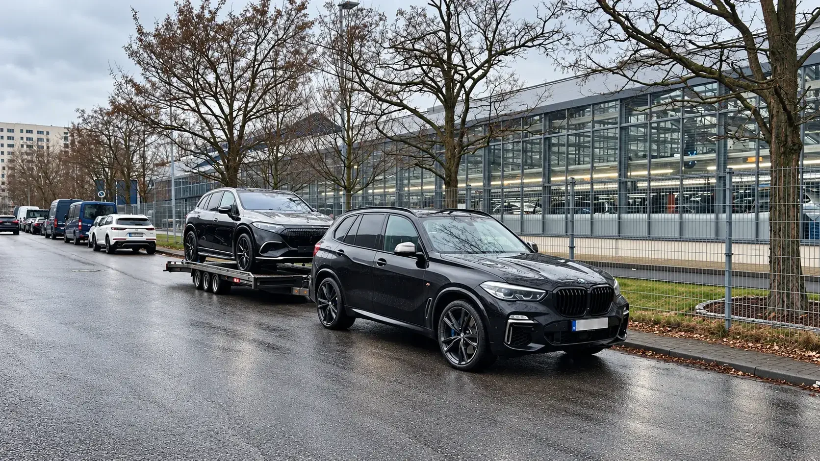 BMW X5 with a car on the CLIM trailer